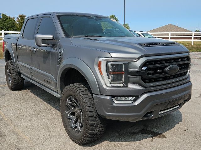 Used 2021 Ford F-150 Lariat with VIN 1FTFW1E58MKE96369 for sale in Kansas City