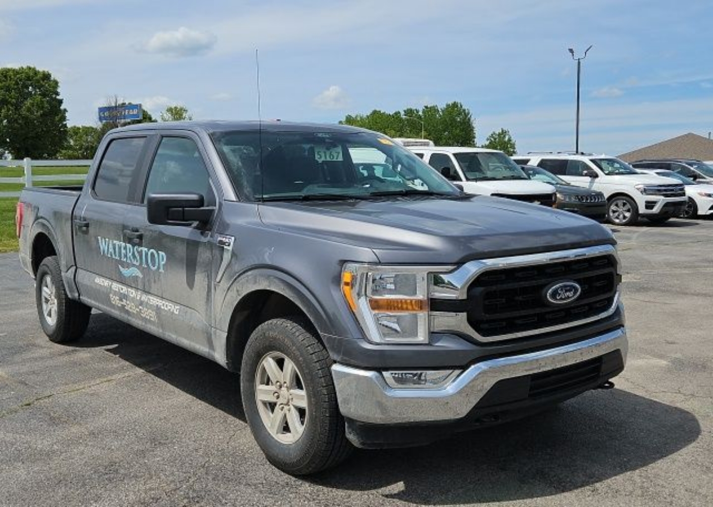 Used 2021 Ford F-150 XLT with VIN 1FTFW1E54MFB00978 for sale in Kansas City