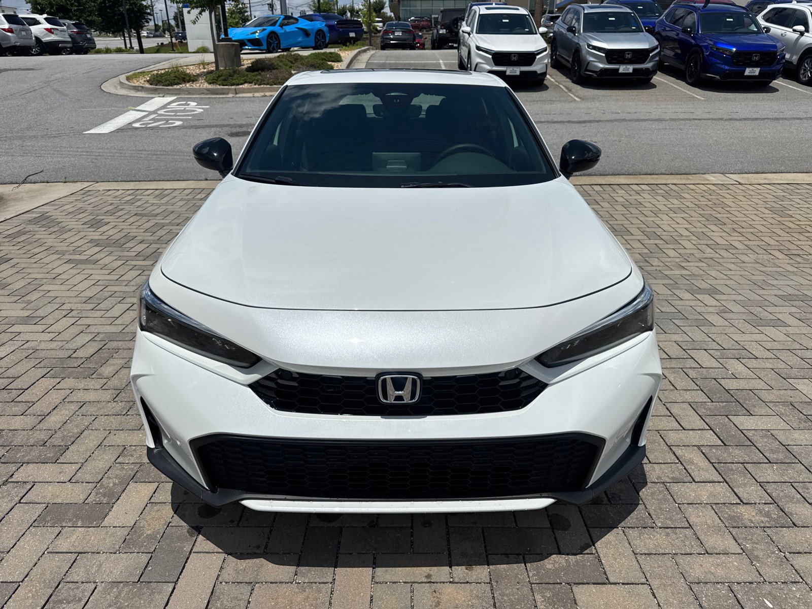 2025 Honda Civic Hatchback Hybrid Sport Touring photo 2