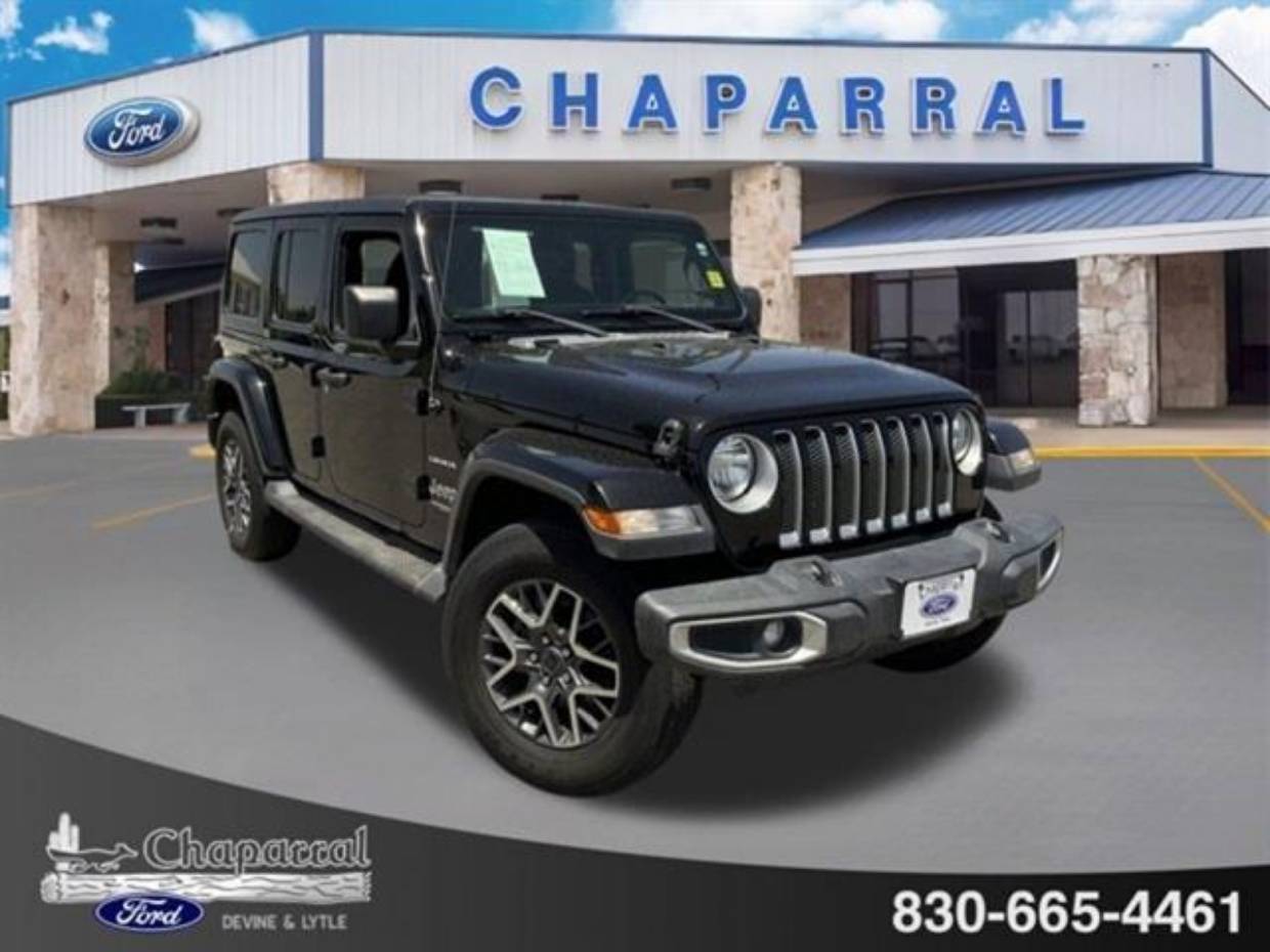 Used 2019 Jeep Wrangler Unlimited Sahara with VIN 1C4HJXEN0KW595980 for sale in Devine, TX