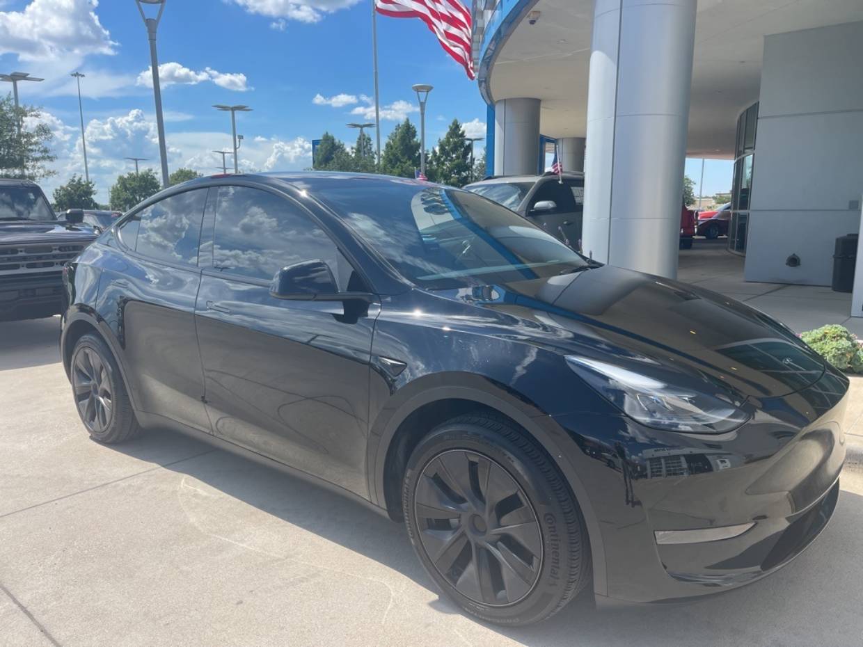 Used 2024 Tesla Model Y Long Range with VIN 7SAYGDED2RA322669 for sale in Northfield, Minnesota