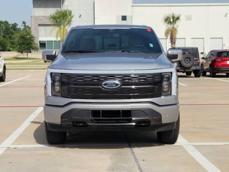 Used 2023 Ford F-150 Lightning Platinum with VIN 1FT6W1EV4PWG14513 for sale in Humble, TX