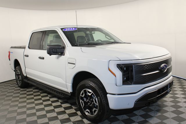 Used 2023 Ford F-150 Lightning XLT with VIN 1FTVW1ELXPWG38812 for sale in Kansas City, MO