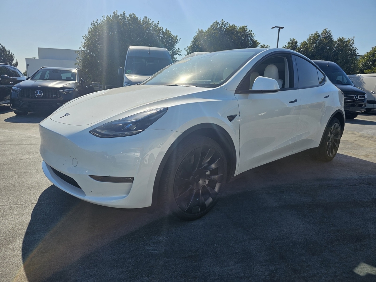Used 2024 Tesla Model Y Long Range with VIN 7SAYGAEE8RF077449 for sale in Kansas City