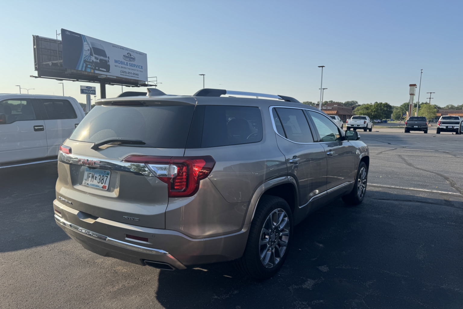 Used 2022 GMC Acadia Denali with VIN 1GKKNXLS4NZ174595 for sale in St. Cloud, Minnesota