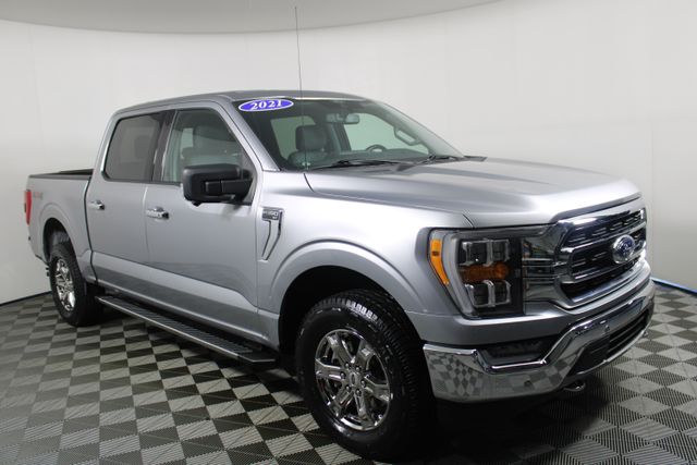 Used 2021 Ford F-150 XLT with VIN 1FTFW1E57MFB09576 for sale in Kansas City