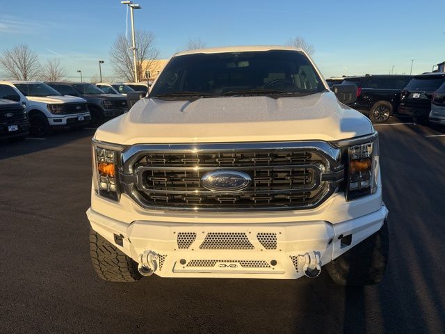 Used 2021 Ford F-150 XLT with VIN 1FTFW1E8XMFB42498 for sale in Kansas City