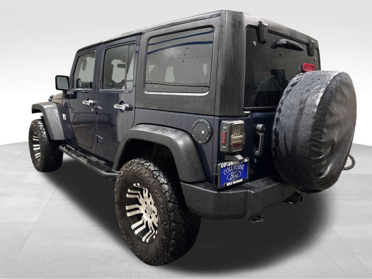 Used 2013 Jeep Wrangler Unlimited Sport with VIN 1C4BJWDG4DL574427 for sale in Rifle, CO
