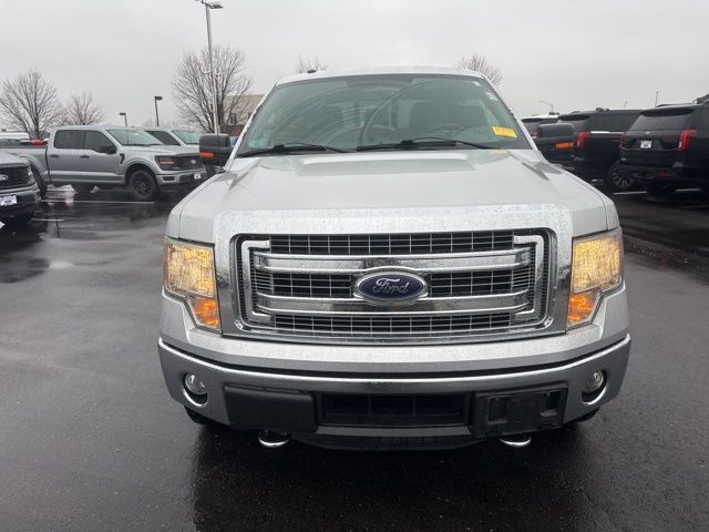 Used 2014 Ford F-150 XLT with VIN 1FTFW1ET3EFC50824 for sale in Kansas City