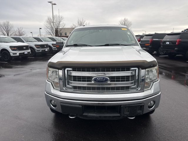 Used 2014 Ford F-150 XLT with VIN 1FTFW1ET2EFB84945 for sale in Kansas City