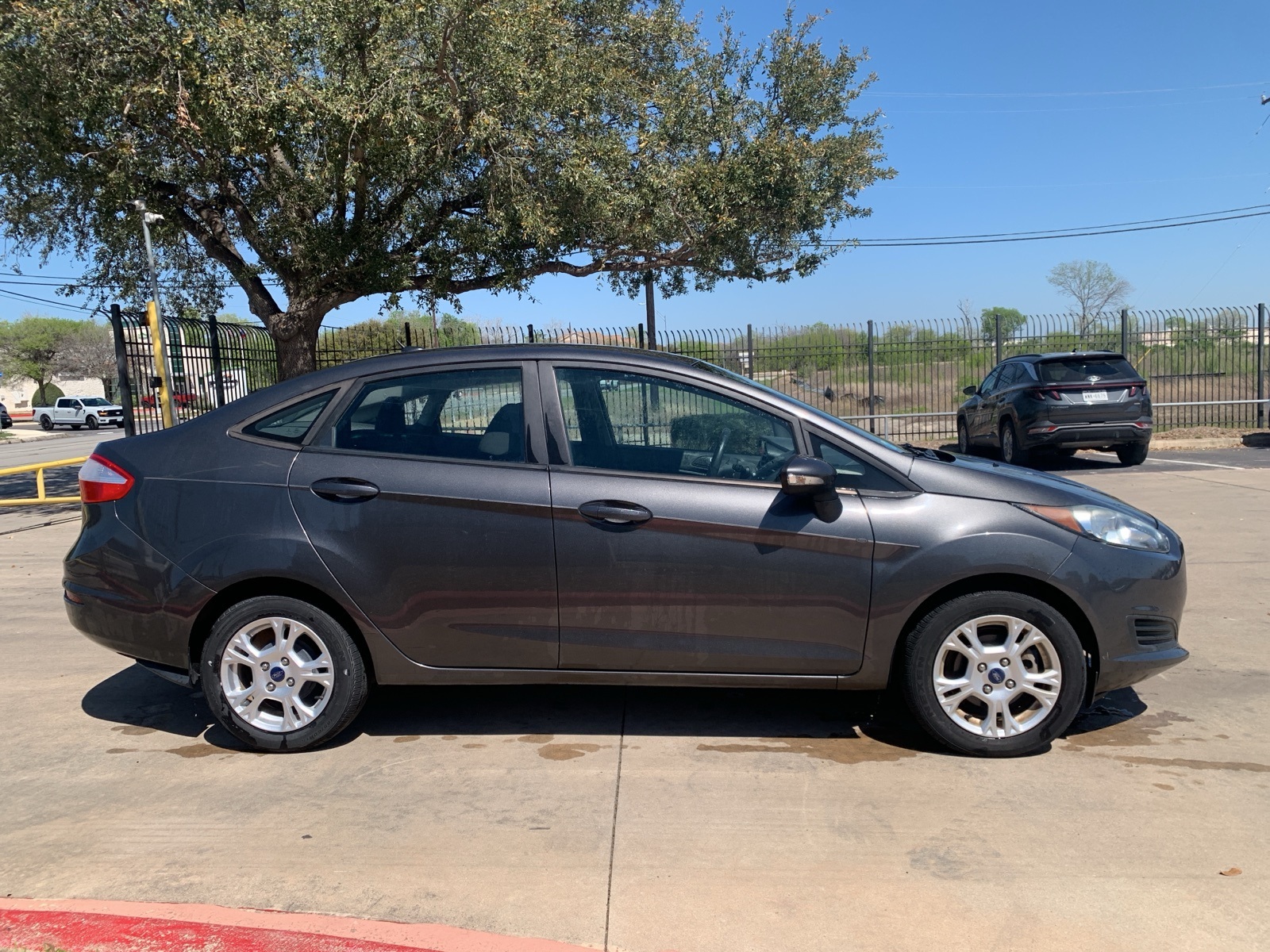Used 2015 Ford Fiesta SE with VIN 3FADP4BJ3FM217001 for sale in San Antonio, TX