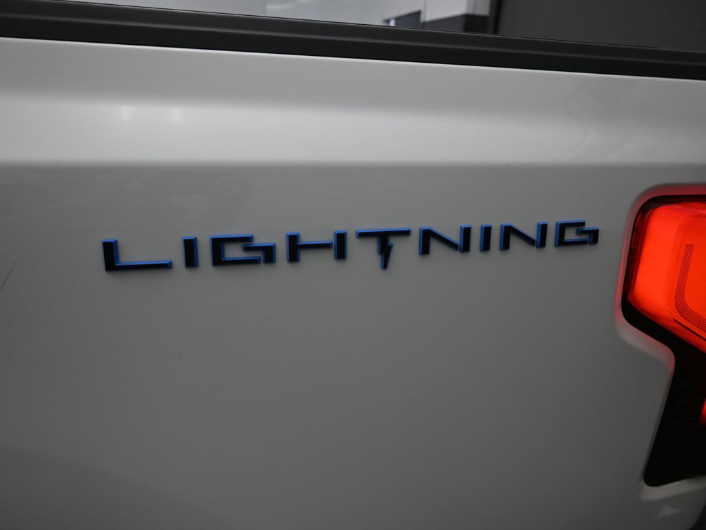 Certified 2023 Ford F-150 Lightning Lariat with VIN 1FTVW1EV5PWG04617 for sale in Houston, TX