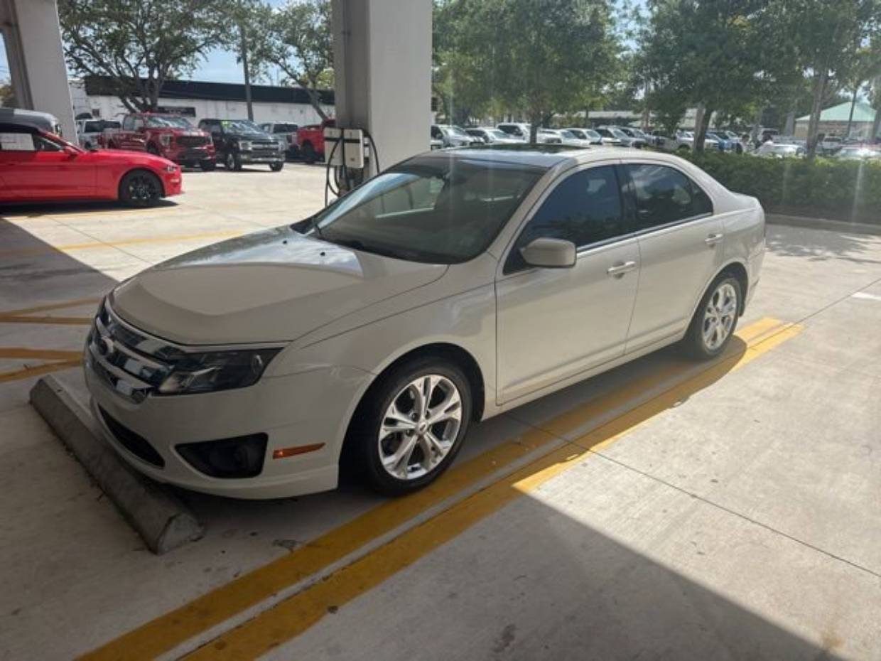 Used 2012 Ford Fusion SE with VIN 3FAHP0HA4CR105453 for sale in Naples, FL