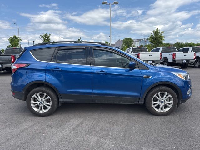 Used 2018 Ford Escape SE with VIN 1FMCU9GD8JUB72703 for sale in Kansas City