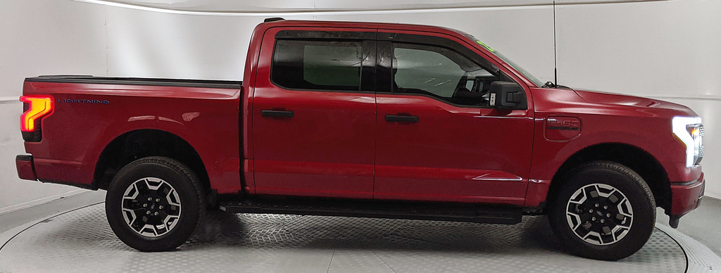 Certified 2023 Ford F-150 Lightning XLT with VIN 1FTVW1EL1PWG39900 for sale in Albuquerque, NM