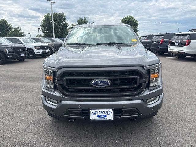 Used 2021 Ford F-150 XLT with VIN 1FTFW1E50MFC48562 for sale in Kansas City