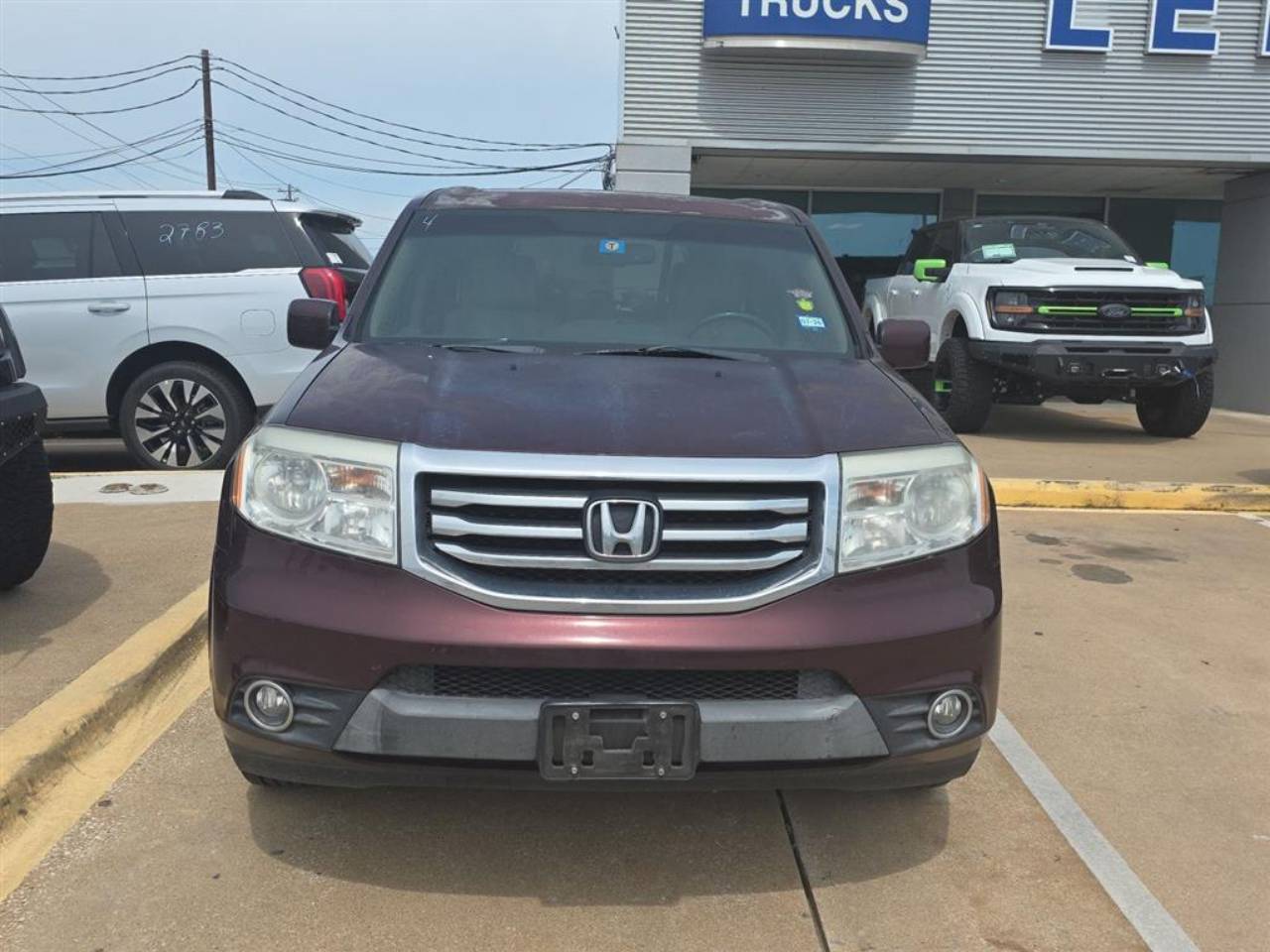 Used 2014 Honda Pilot EX-L with VIN 5FNYF3H58EB023117 for sale in Buda, TX