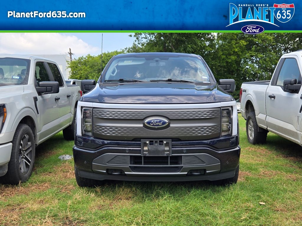 Used 2023 Ford F-150 Lightning XLT with VIN 1FT6W1EV1PWG38283 for sale in Garland, TX