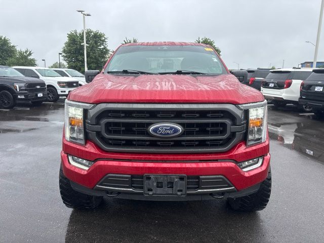 Used 2021 Ford F-150 XLT with VIN 1FTFW1E53MKD13024 for sale in Kansas City