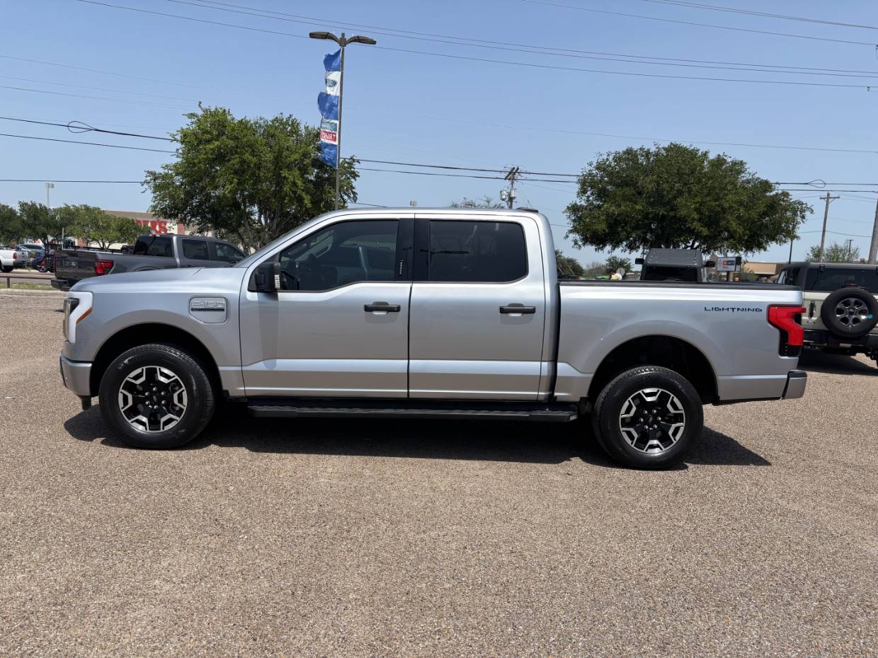Certified 2023 Ford F-150 Lightning XLT with VIN 1FTVW1EL1PWG38973 for sale in Edinburg, TX